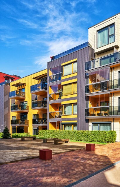 Benches at Modern complex of apartment residential buildings. Other outdoor facilities.