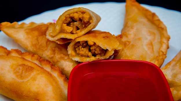 Bengali Beef Puli Pitha Fried on Black Background