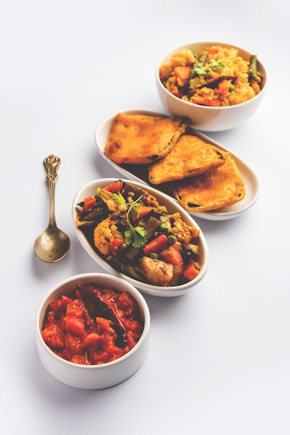 Bengali Bhog food for Indian Hindu Durga Puja or pooja festival Khichadi labra tomato chutney