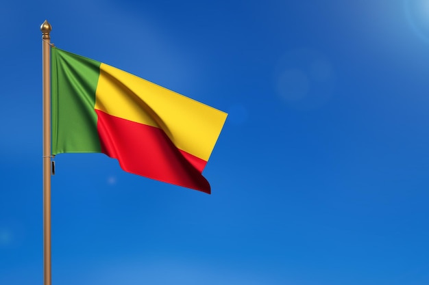 Benin Flag blown by the wind with blue sky in the background