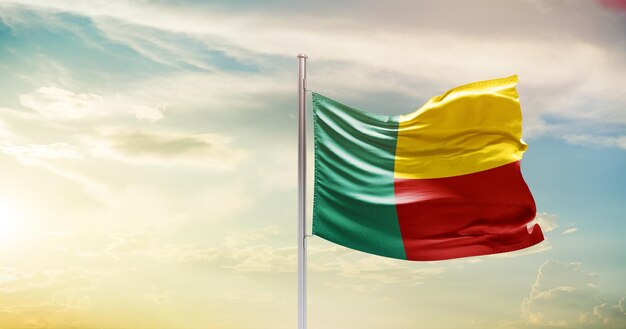 benin national flag waving in beautiful sky