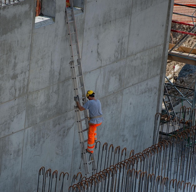 Bergamo Italy April 2018 workers at work for the construction of the sewage treatment plant