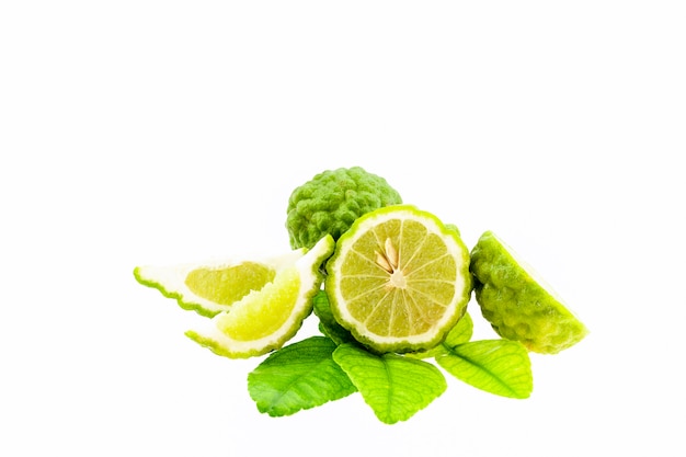 Bergamot fruit and leaves isolated on white background