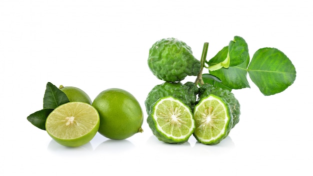 Bergamot and lime on white background