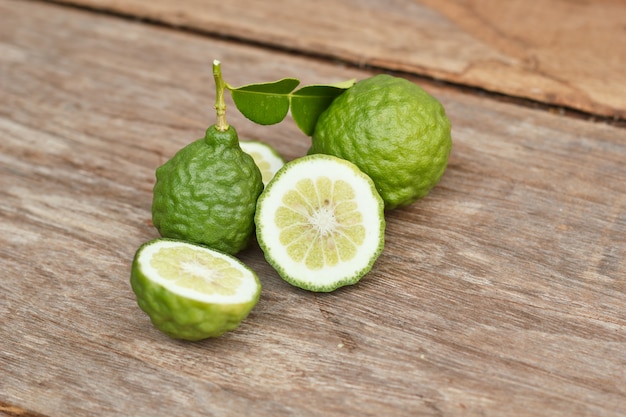 Bergamot on wooden background.