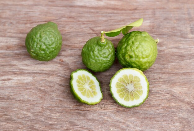 Bergamot on wooden background.