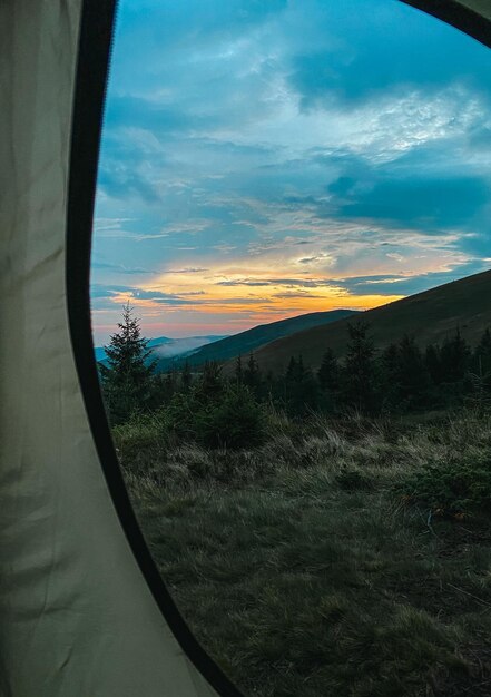 berglandschap zonsondergang in de bergen, uitzicht vanuit de tent behang Karpaten toerisme wandelen