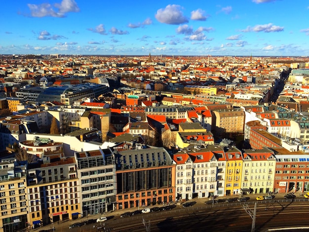 Berlin cityscape against cloudy sky