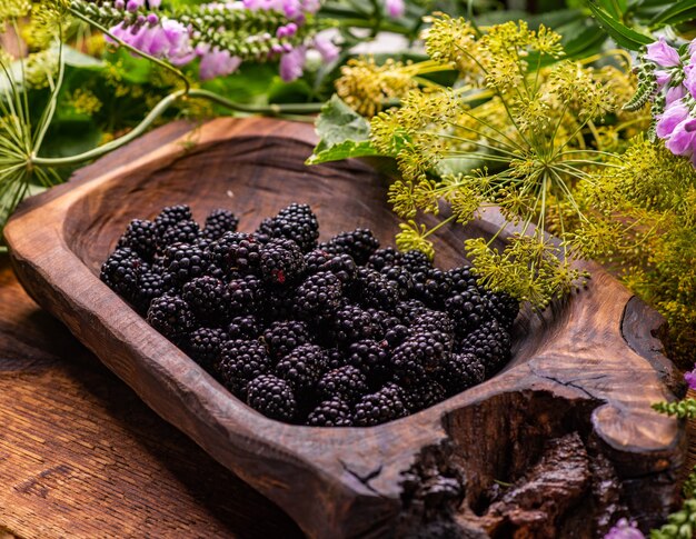 Berries blackberries on wooden background