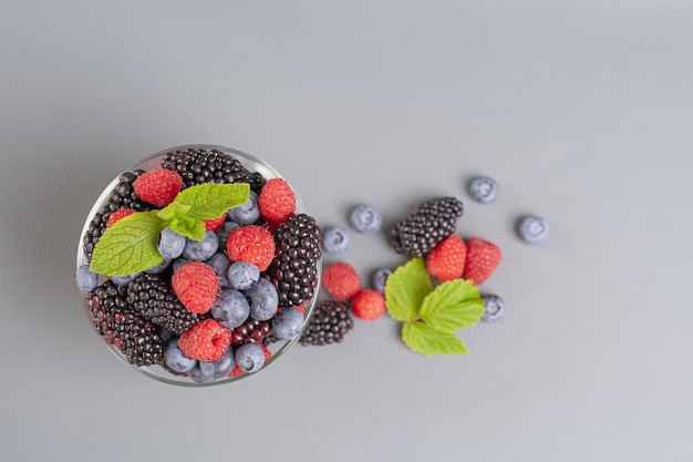 berries in a bowl on a gray background