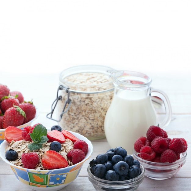 Berries and cereals on a wooden table