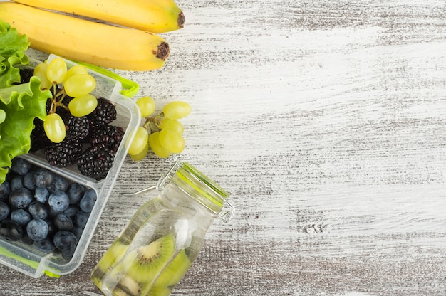 Berries in lunch box and fruits