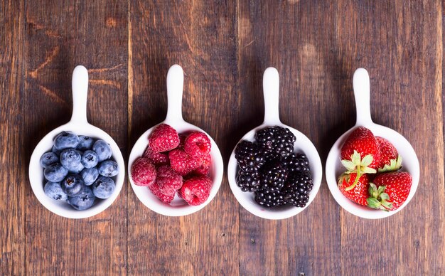 Berries strawberry raspberry blueberries blackberries in bowl