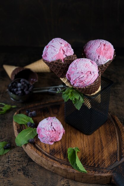 Berry ice cream in a waffle cone