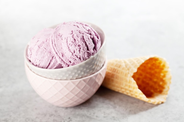 Berry ice cream and waffle cones