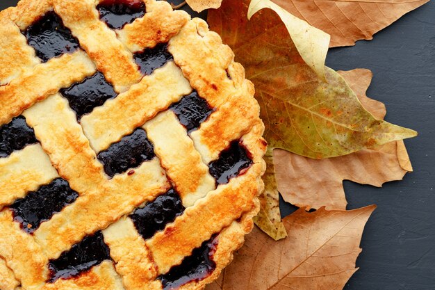 Berry tart pie served on table close up