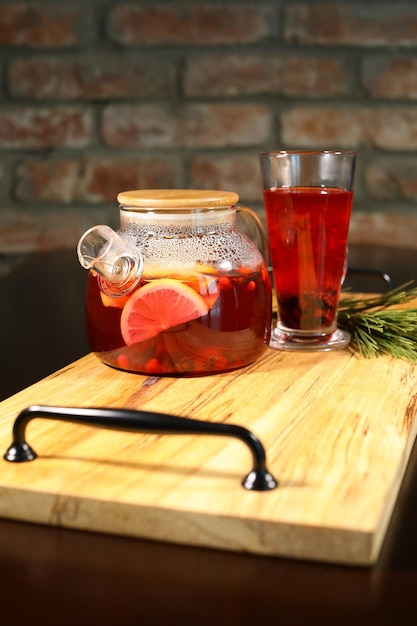 berry tea and a decorative wooden plate is very beautiful for vegetables and cookies