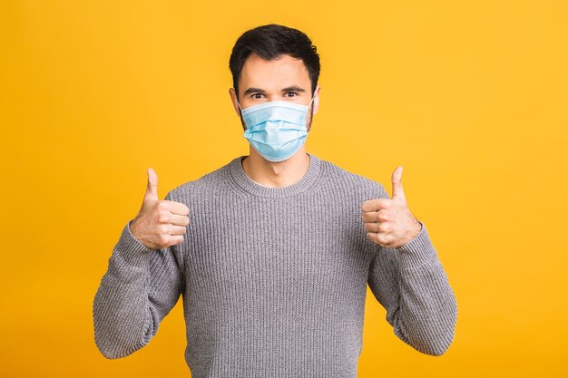 Bescherming tegen besmettelijke ziekten, coronavirus, covid-19. Man met hygiënisch masker om infectie te voorkomen