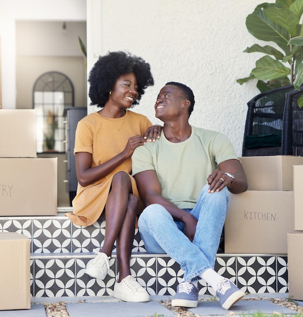 Beside each other for always Shot of a young couple moving into their new house