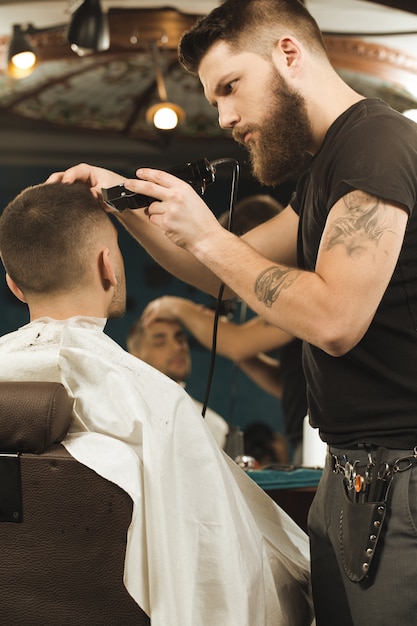 The best barber. Vertical low angle shot of a barber working