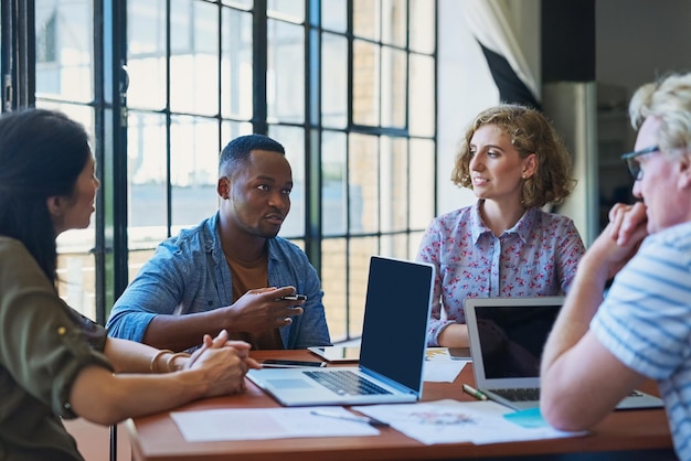 The best businesses have the best talent Shot of a diverse group of businesspeople having a meeting in a modern office