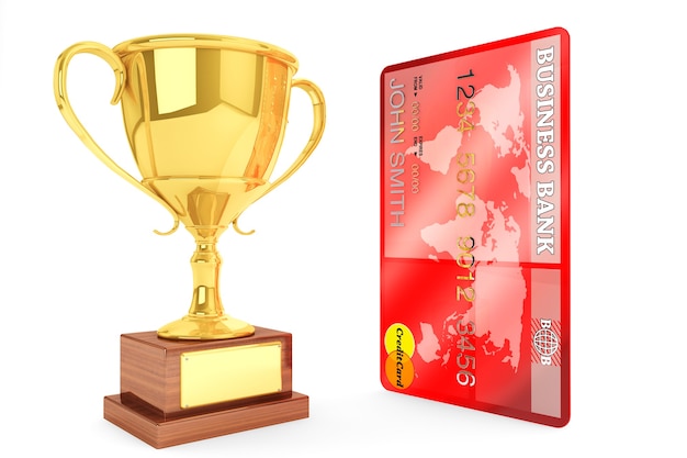 Photo best credit concept. champion gold cup trophy with credit card on a white background