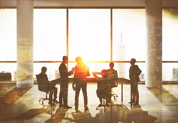 besuited men at meeting