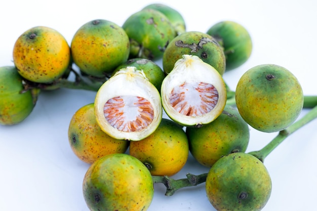 Betel nuts on white background.