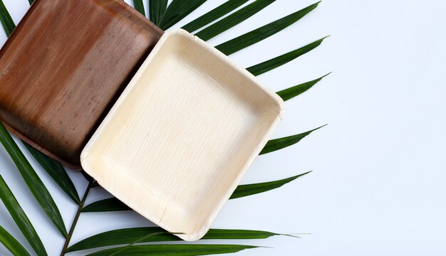 Betel palm leaf plates isolated