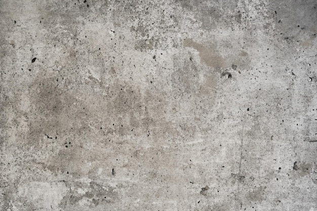 Beton grijze textuur en poreuze muurachtergrond