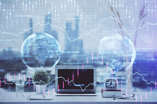 Beursgrafiek op achtergrond met bureau en personal computer Multiblootstelling Concept financiële analyse