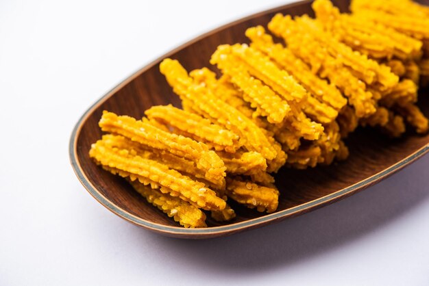 Photo bhajni chakli sticks or crunchy murukku snack made using diwali festival favourite munching food