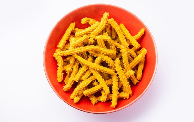 Photo bhajni chakli sticks or crunchy murukku snack made using diwali festival favourite munching food