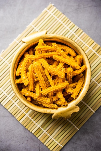 Photo bhajni chakli sticks or crunchy murukku snack made using diwali festival favourite munching food