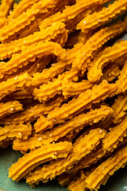 Photo bhajni chakli sticks or crunchy murukku snack made using diwali festival favourite munching food