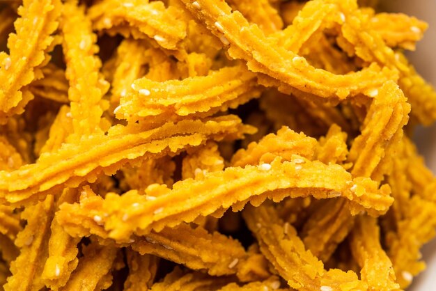 Bhajni chakli stokken of knapperige murukku snack gemaakt met behulp van Diwali festival favoriete munching voedsel