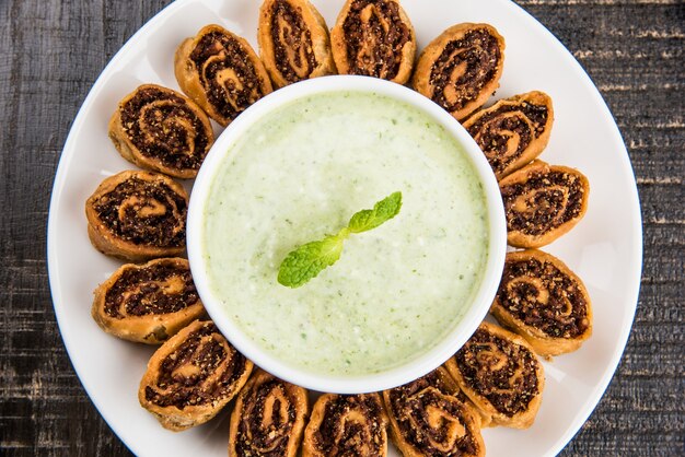 Bhakarwadi also spelled as Bakarwadi or spring roll, is a traditional sweet and spicy tea  time snack originated in Pune, Maharashtra