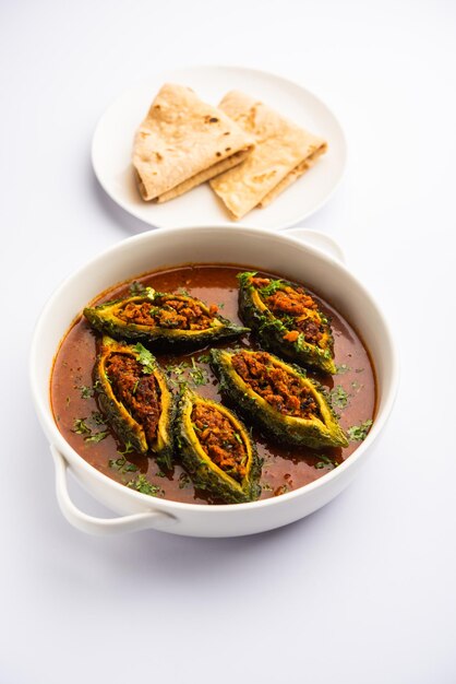 Bharwa Karela masala or stuffed bitter melon curry recipe