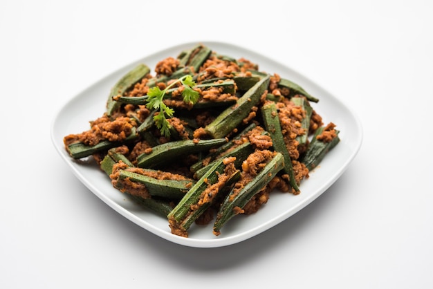 Bharwa Masala Bhindi or Stuffed Okra is an indian main course vegetable recipe made using ladies' fingers or ochro and spices