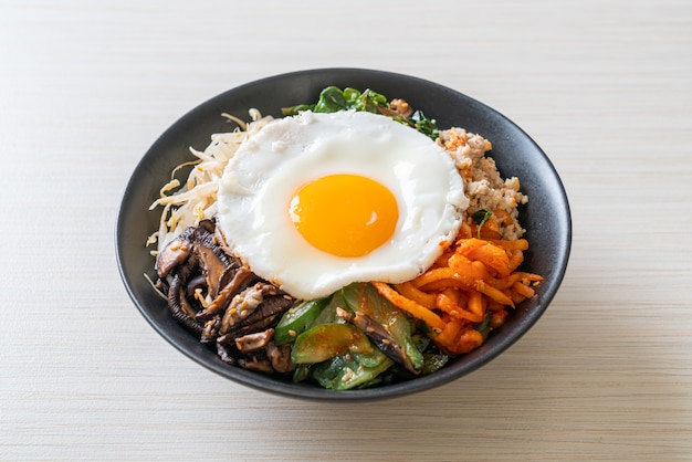 Bibimbap, Korean spicy salad with rice and fried egg