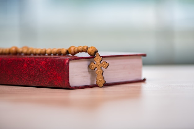 Bible and cross in religious concept