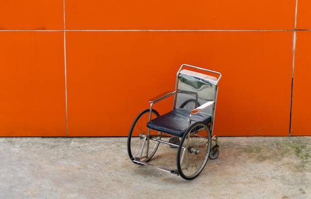 Bicycle against orange wall