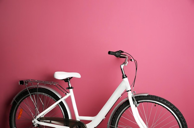 Bicycle on color background