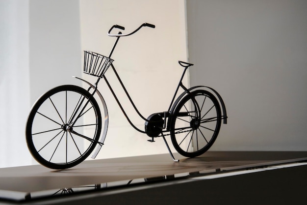 bicycle in front of a wall