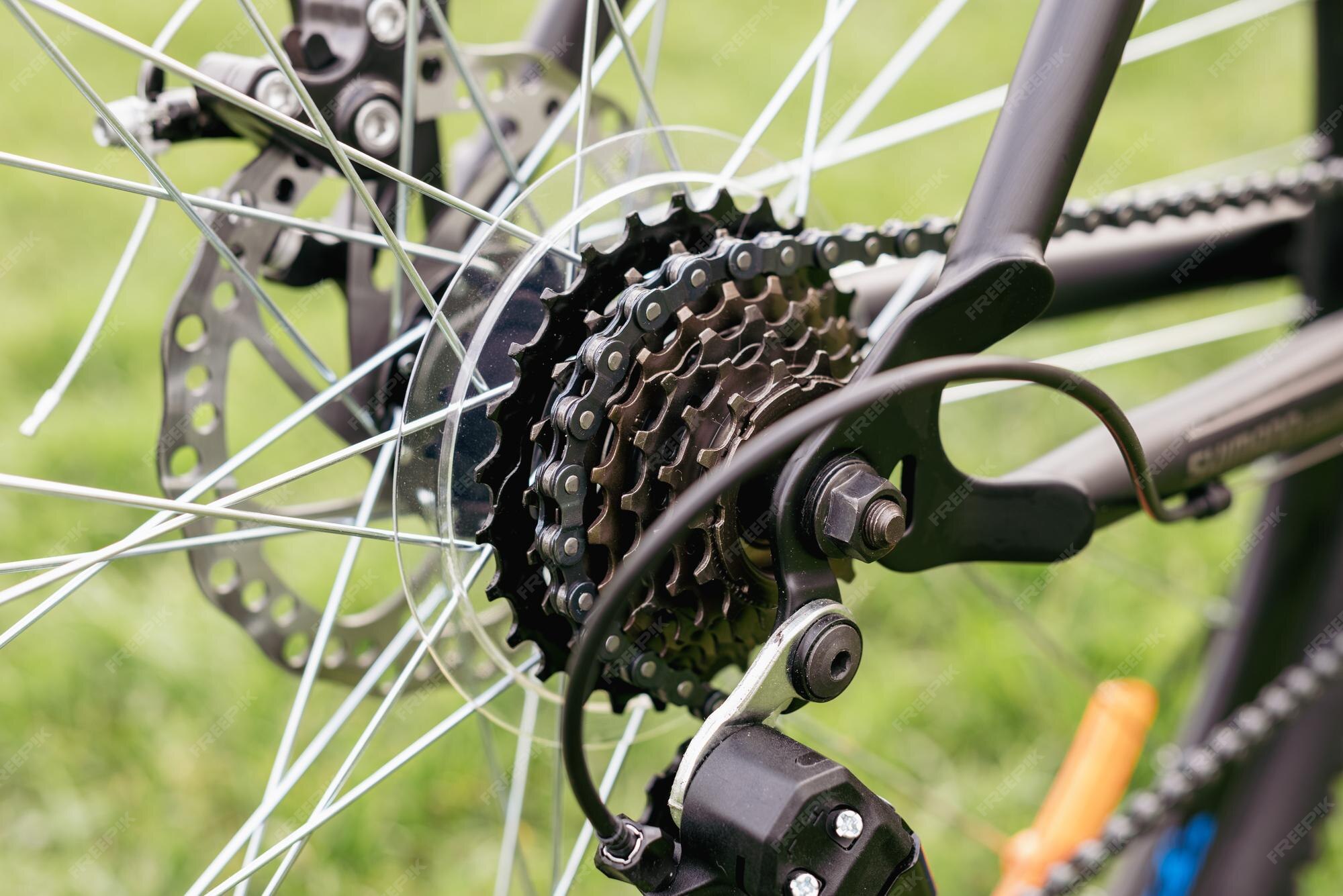 Premium Photo Bicycle gears disc brake and rear derailleur the