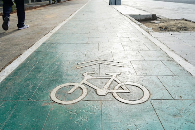 bicycle lane, traffic, city transportation and eco-friendly concept, green bicycle lane