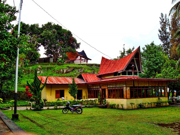 Bicycle parked in front of house