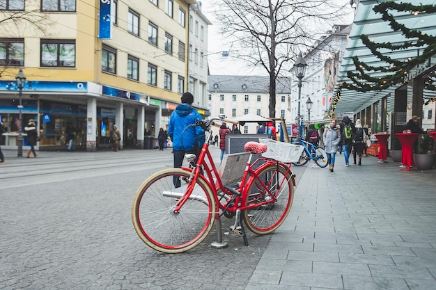Bicycle on street against buildings in city