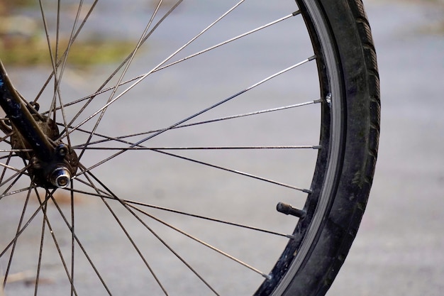 bicycle wheel on the street, bicycle mode of transport