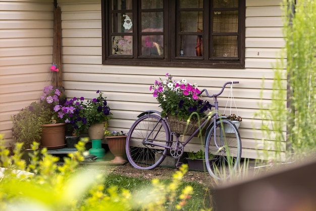 Bicycle with flowers as an element of landscape design